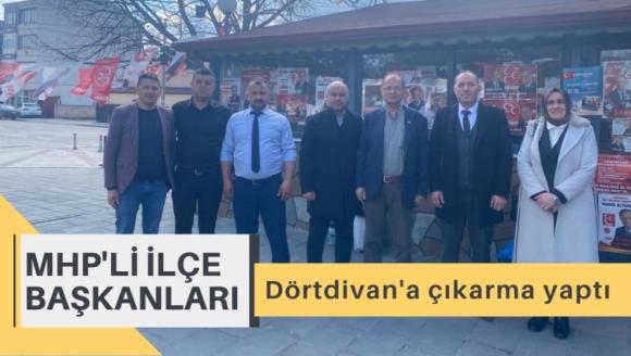 MHP'li İlçe Başkanları Dörtdivan'a çıkarma yaptı